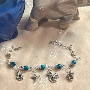 Silver Wire Wrapped Turquoise Stones w Nature charms